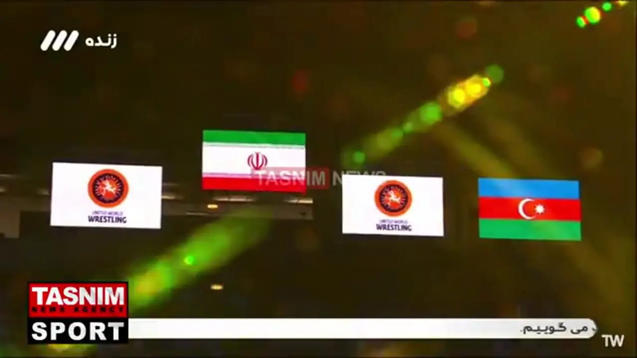 اهدای مدال و کمربند قهرمانی «محمدهادی ساروی» و پخش سرود ایران در سالن برگزاری مسابقات کشتی فرنگی قهرمانی جهان + فیلم
