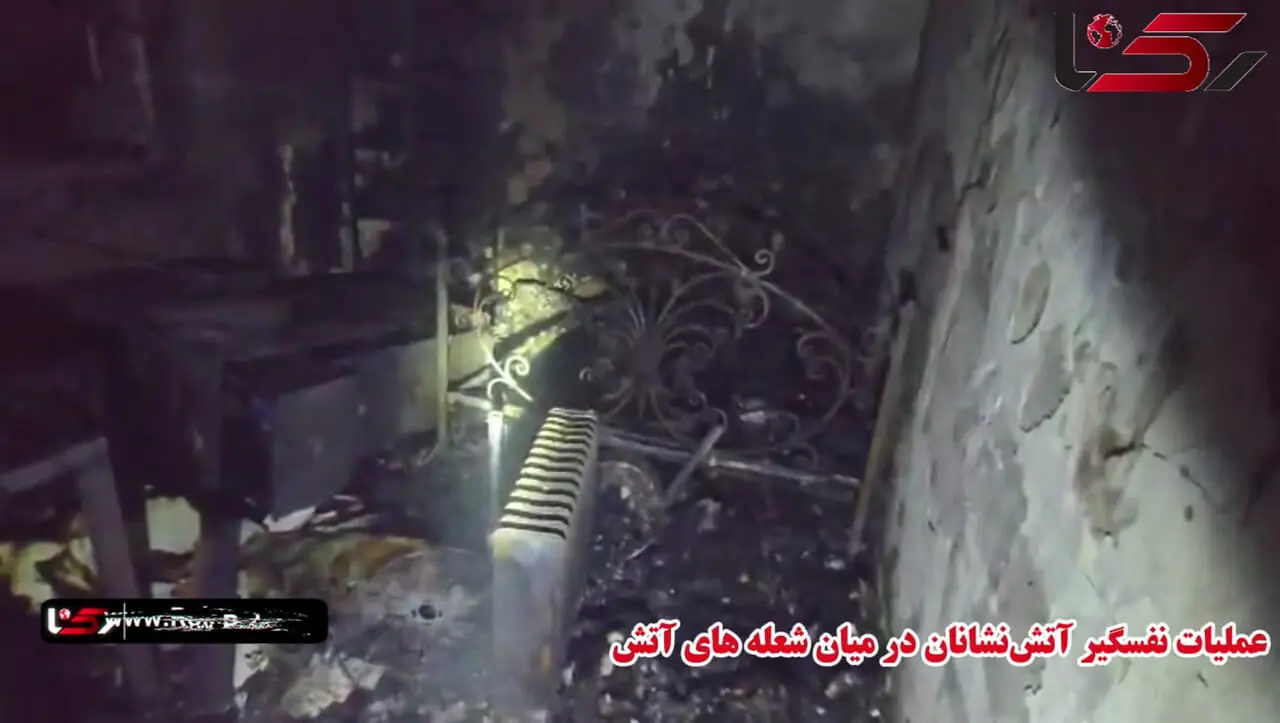 فیلم آتش‌سوزی شبانه در ولیعصر تهران / عملیات نفسگیر آتش‌نشانان در میان شعله های آتش