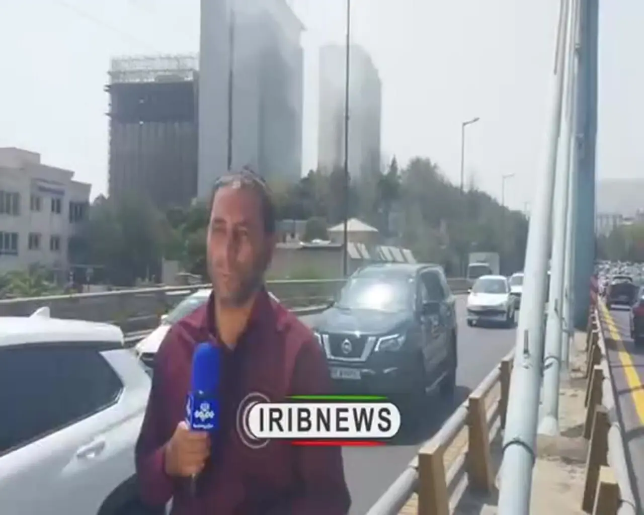 فیلم حمله به خبرنگار صداوسیما هنگام تهییه گزارش رد آتش سوزی هتل استقلال